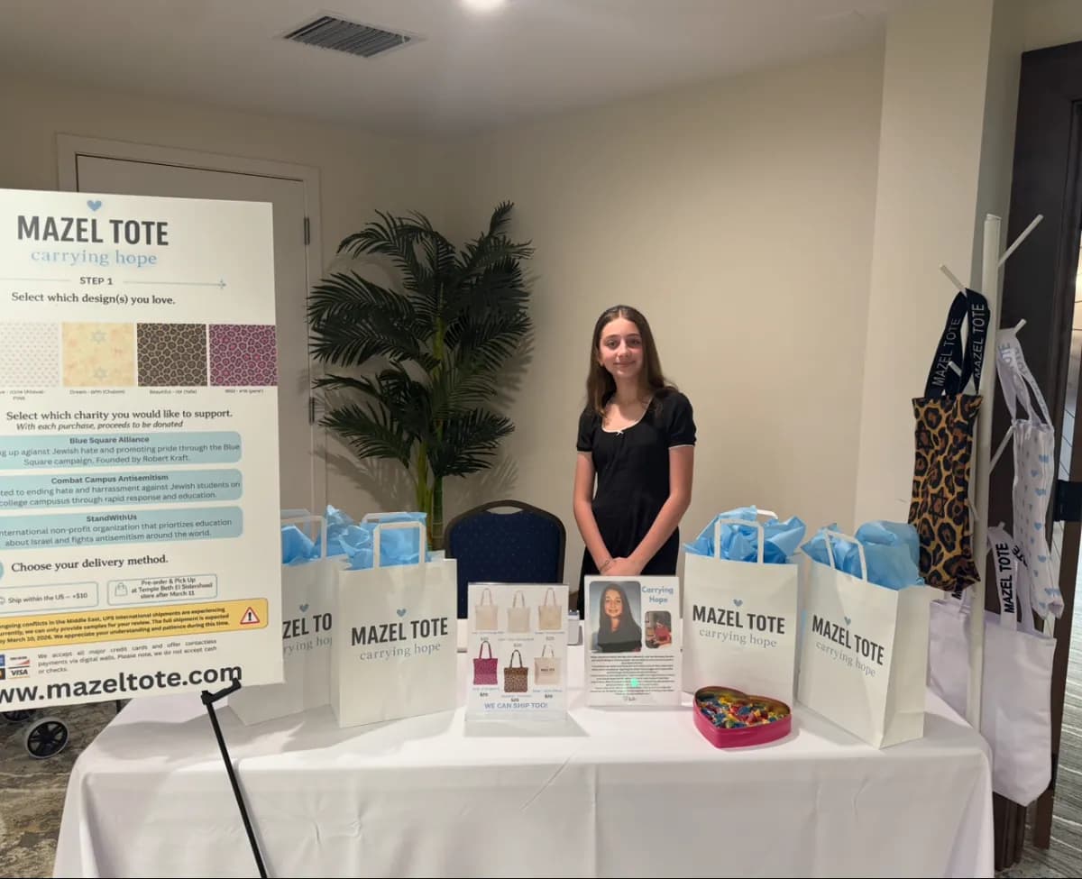 Brielle at the Mazel Tote booth